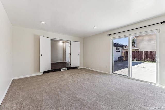 8641 Lowell Blvd, Westminster, CO 80031 - unfurnished bedroom featuring access to outside, carpet floors, baseboards, and recessed lighting