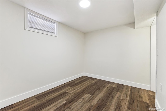 8641 Lowell Blvd, Westminster, CO 80031 - empty room featuring dark wood-style floors and baseboards