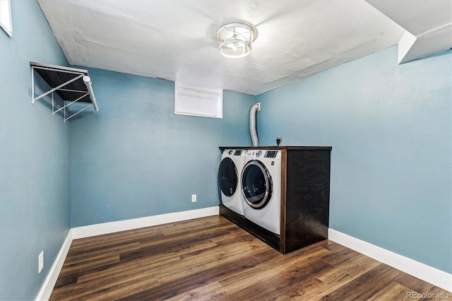 8641 Lowell Blvd, Westminster, CO 80031 - washroom with washing machine and clothes dryer, baseboards, and dark wood-style floors