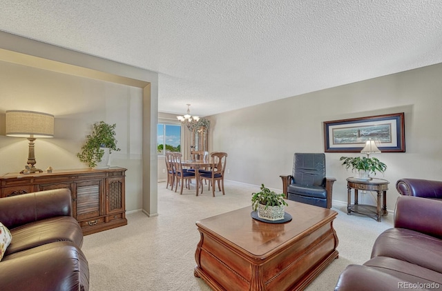 3317 S Elkhart St, Aurora, CO 80014 - living room with a chandelier, light carpet, and a textured ceiling