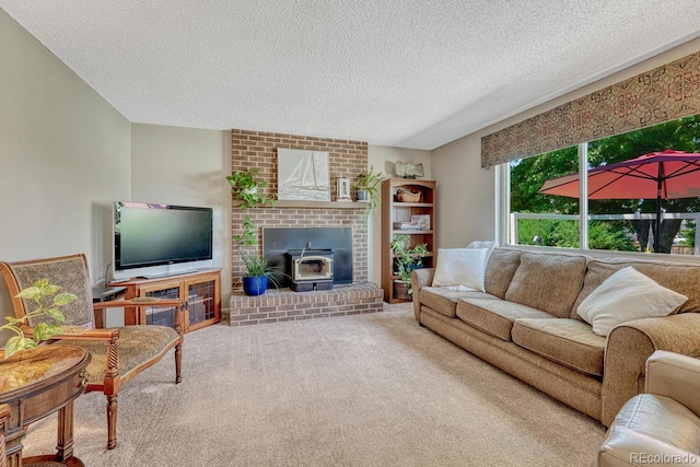 3317 S Elkhart St, Aurora, CO 80014 - living area featuring a textured ceiling, carpet floors, and a wood stove