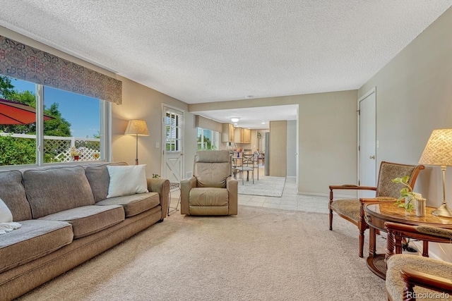 3317 S Elkhart St, Aurora, CO 80014 - living area with a textured ceiling, light colored carpet, and light tile patterned floors