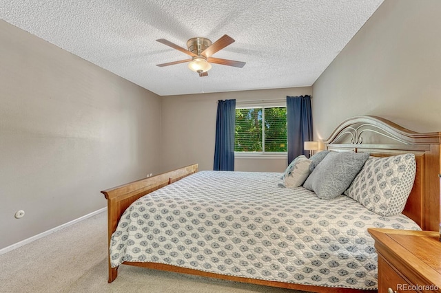 3317 S Elkhart St, Aurora, CO 80014 - bedroom with a textured ceiling, carpet, and a ceiling fan