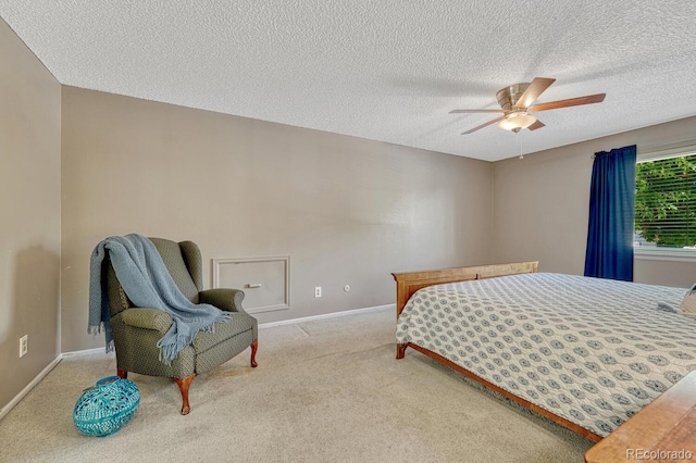 3317 S Elkhart St, Aurora, CO 80014 - carpeted bedroom with a textured ceiling and ceiling fan