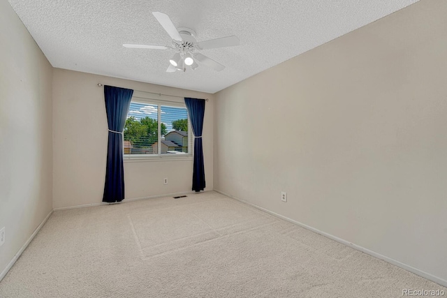 3317 S Elkhart St, Aurora, CO 80014 - empty room featuring a textured ceiling, a ceiling fan, and carpet floors