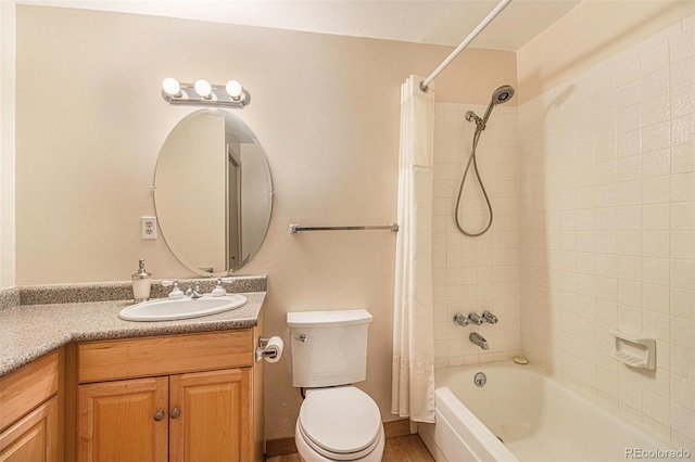 bathroom featuring shower / bath combination with curtain, vanity, and toilet