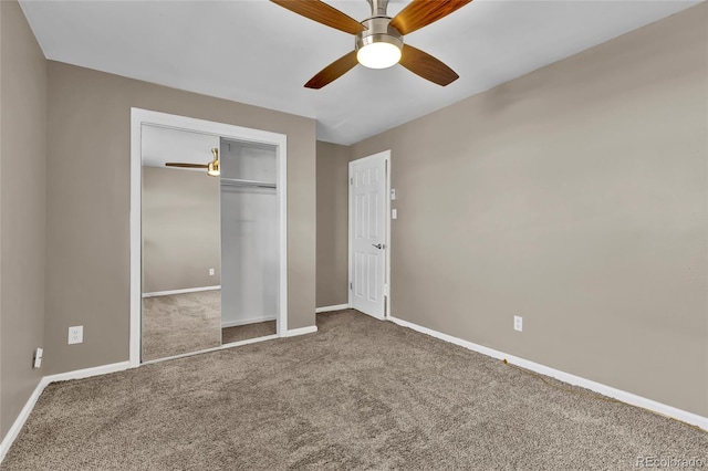 unfurnished bedroom featuring a ceiling fan, carpet, baseboards, and a closet