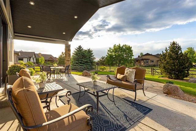 7992 Rising Sun Ct, Windsor, CO 80550 - view of patio featuring an outdoor hangout area and outdoor dining space