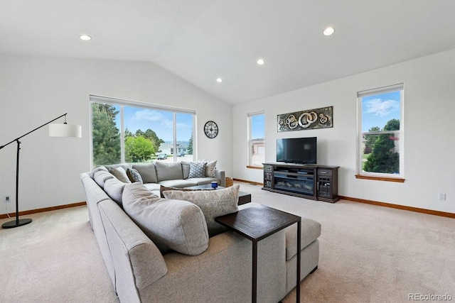 3 Desert Inn Way, Colorado Springs, CO 80921 - living area with light colored carpet, lofted ceiling, baseboards, and recessed lighting