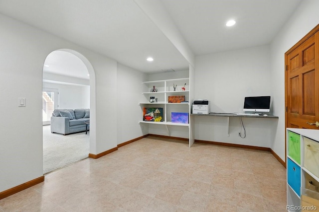 3 Desert Inn Way, Colorado Springs, CO 80921 - office featuring arched walkways, baseboards, recessed lighting, and light carpet