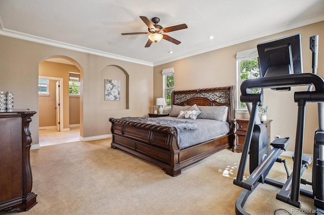 8526 E 35th Ave, Denver, CO 80238 - carpeted bedroom featuring arched walkways, ornamental molding, a ceiling fan, and recessed lighting