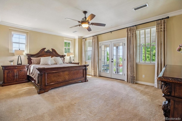 8526 E 35th Ave, Denver, CO 80238 - bedroom featuring access to exterior, ornamental molding, multiple windows, french doors, and carpet floors