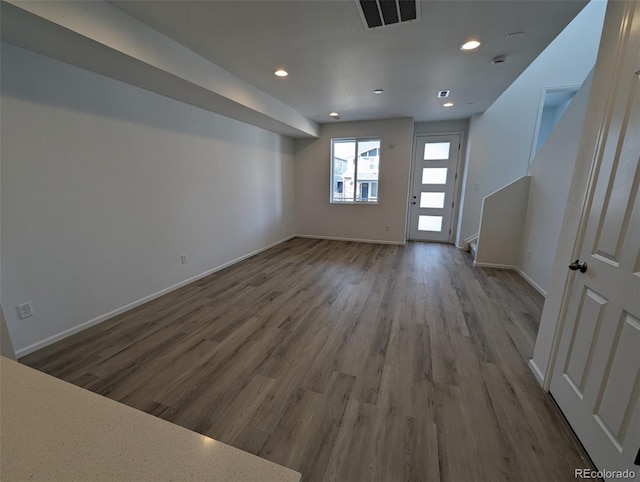 empty room featuring hardwood / wood-style floors