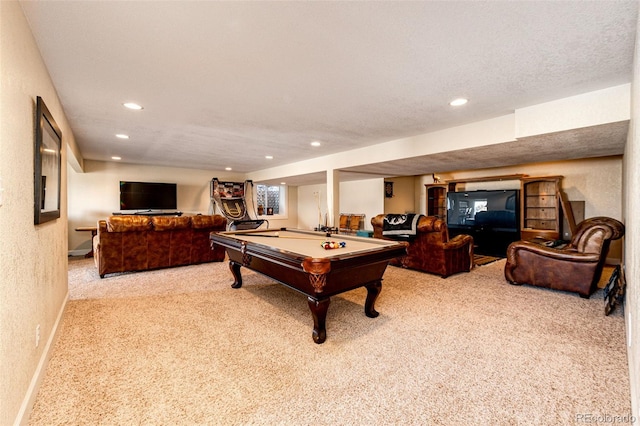 rec room featuring light carpet, a textured ceiling, and billiards