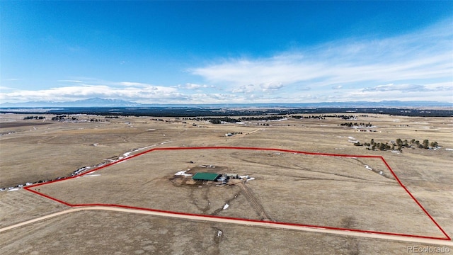 aerial view featuring a mountain view and a rural view