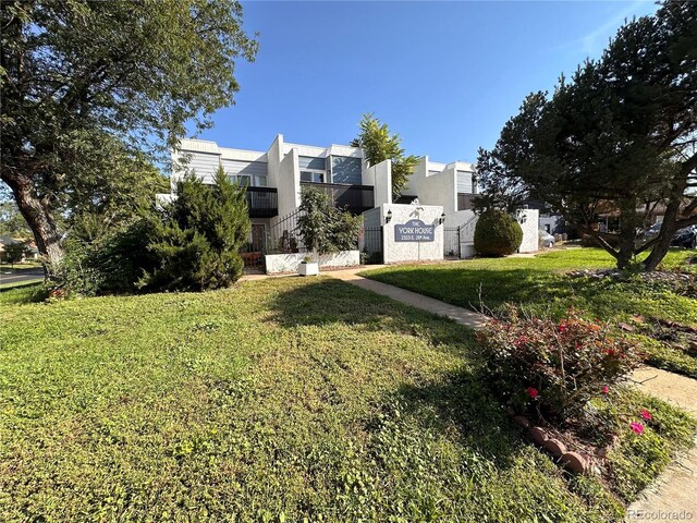 exterior space with a front lawn