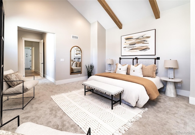 bedroom featuring light colored carpet, beam ceiling, and high vaulted ceiling