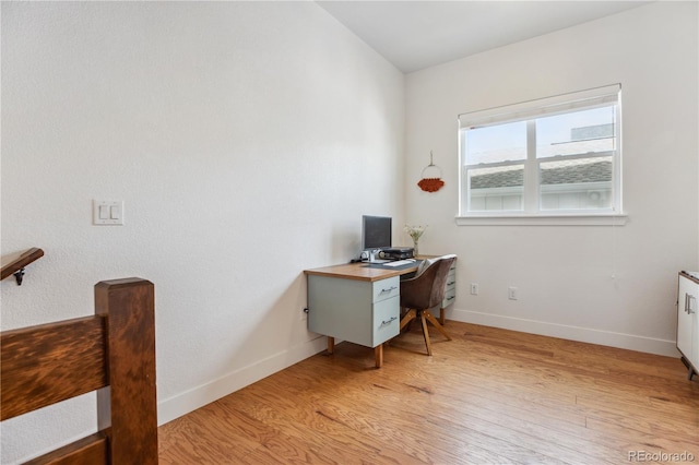10165 E 59th Ave, Denver, CO 80238 - office area featuring light wood-type flooring and baseboards