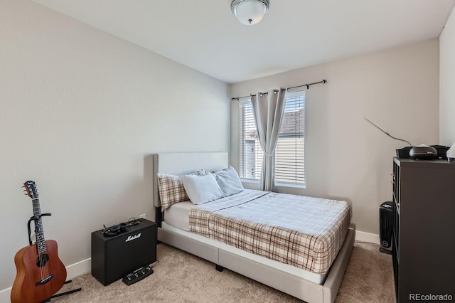 bedroom with light carpet