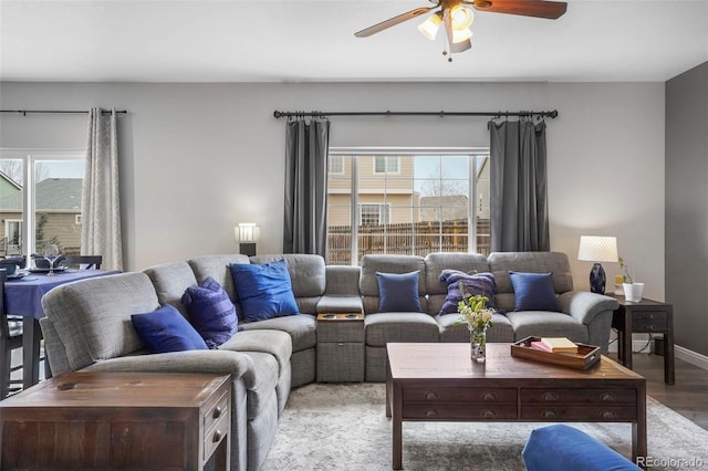 6464 Elsinore Dr, Colorado Springs, CO 80923 - living room featuring a wealth of natural light, light wood-style flooring, and a ceiling fan