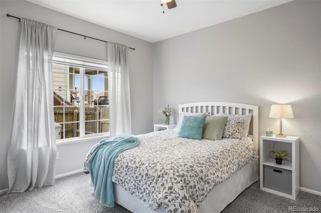6464 Elsinore Dr, Colorado Springs, CO 80923 - carpeted bedroom with baseboards and a ceiling fan