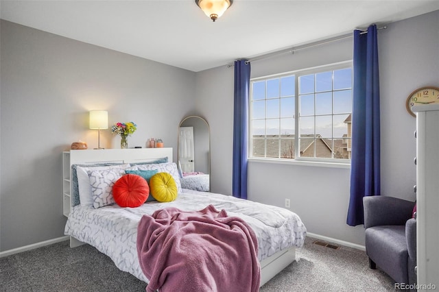 6464 Elsinore Dr, Colorado Springs, CO 80923 - carpeted bedroom featuring visible vents and baseboards