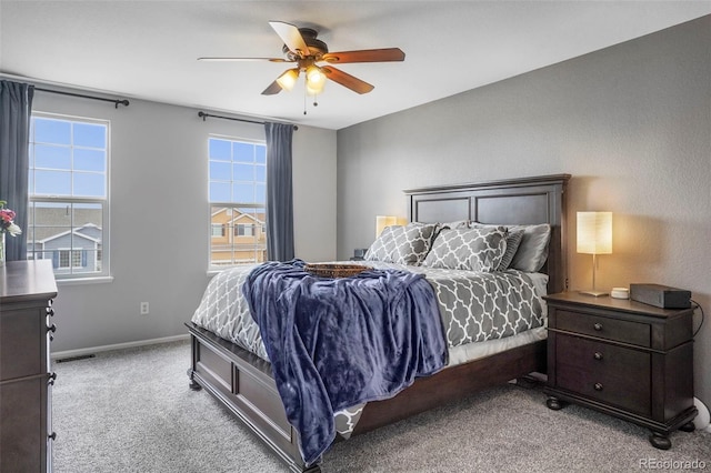 6464 Elsinore Dr, Colorado Springs, CO 80923 - carpeted bedroom featuring visible vents, baseboards, and ceiling fan