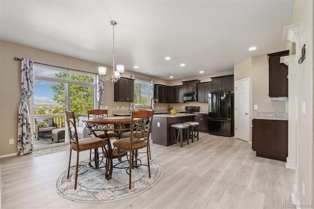 42311 Forest Oaks Dr, Elizabeth, CO 80107 - dining room featuring light wood-style flooring, a chandelier, recessed lighting, and baseboards