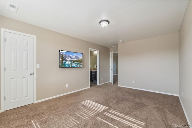42311 Forest Oaks Dr, Elizabeth, CO 80107 - unfurnished bedroom featuring carpet floors, baseboards, and connected bathroom