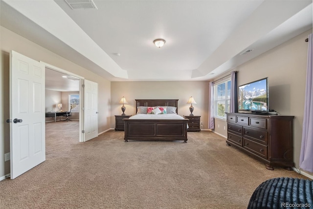 42311 Forest Oaks Dr, Elizabeth, CO 80107 - bedroom featuring a raised ceiling, light colored carpet, baseboards, and a desk