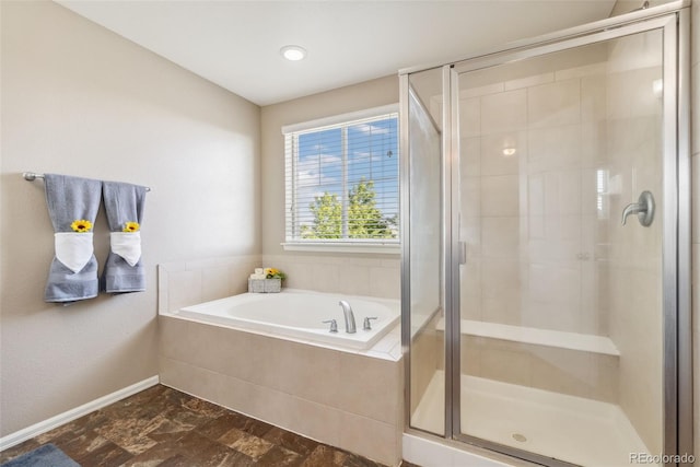 42311 Forest Oaks Dr, Elizabeth, CO 80107 - full bath with a garden tub, a stall shower, and baseboards