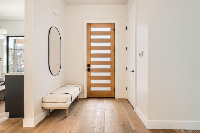 3649 W 21st Ave, Denver, CO 80211 - foyer with light wood-style flooring and baseboards
