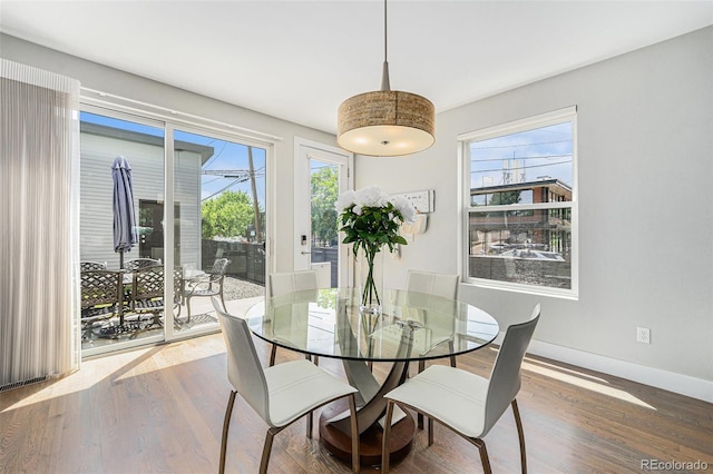 4102 Quivas St, Denver, CO 80211 - dining room featuring wood finished floors and baseboards