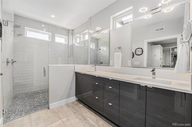 4102 Quivas St, Denver, CO 80211 - full bathroom featuring a stall shower and double vanity