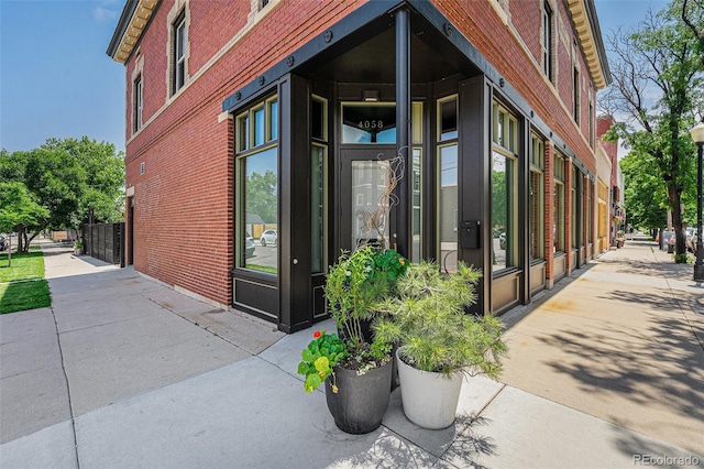 4102 Quivas St, Denver, CO 80211 - doorway to property with brick siding
