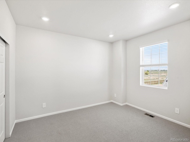 9069 Pitkin St, Commerce City, CO 80022 - unfurnished bedroom with carpet floors, recessed lighting, and baseboards