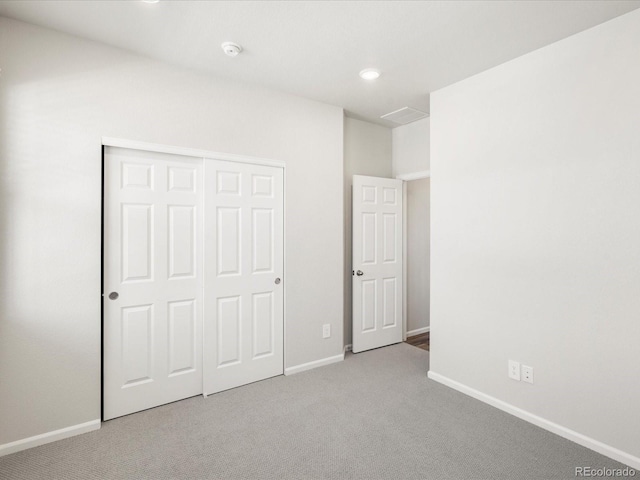 9069 Pitkin St, Commerce City, CO 80022 - unfurnished bedroom with carpet floors, a closet, baseboards, and recessed lighting