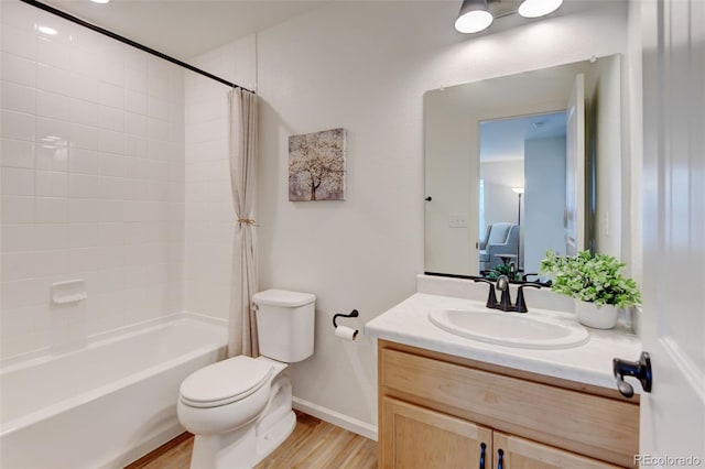 2463 Alpine St, Longmont, CO 80504 - full bathroom with wood finished floors, vanity, and shower / bath combination with curtain