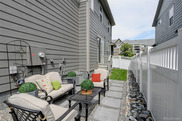 2463 Alpine St, Longmont, CO 80504 - fenced backyard featuring a patio area and an outdoor hangout area