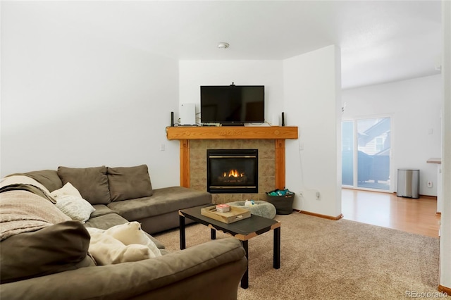 7520 W Coal Mine Ave Unit C, Littleton, CO 80123 - living area featuring carpet and a fireplace