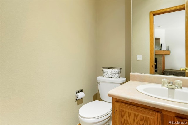 7520 W Coal Mine Ave Unit C, Littleton, CO 80123 - half bath featuring toilet and vanity