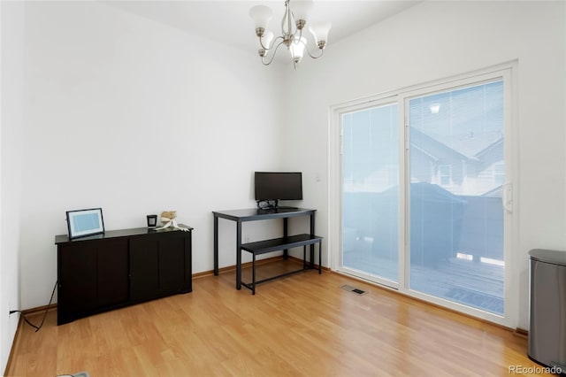 7520 W Coal Mine Ave Unit C, Littleton, CO 80123 - office space with a chandelier and light wood finished floors
