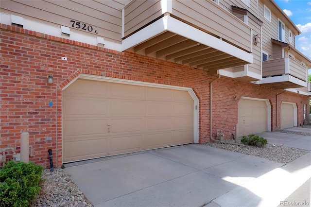 7520 W Coal Mine Ave Unit C, Littleton, CO 80123 - garage with concrete driveway