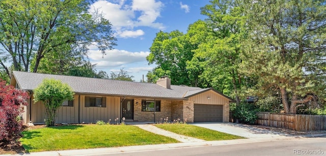 6330 E Vassar Ave, Denver, CO 80222 - single story home with board and batten siding, an attached garage, a chimney, driveway, and stone siding