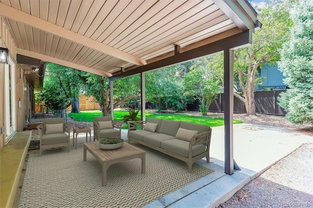 6330 E Vassar Ave, Denver, CO 80222 - fenced backyard featuring a patio and an outdoor hangout area