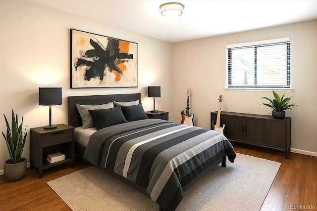 6330 E Vassar Ave, Denver, CO 80222 - bedroom featuring wood finished floors and baseboards