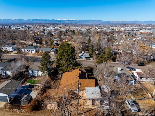 drone / aerial view featuring a mountain view and a residential view