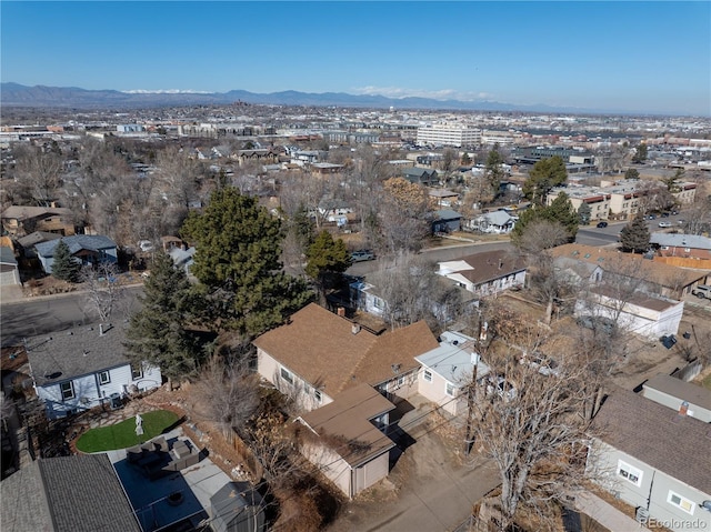 birds eye view of property featuring a mountain view and a residential view