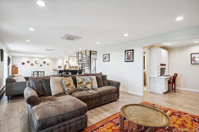 living room with light wood-type flooring