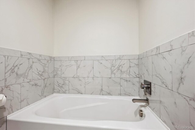 bathroom featuring a bathing tub